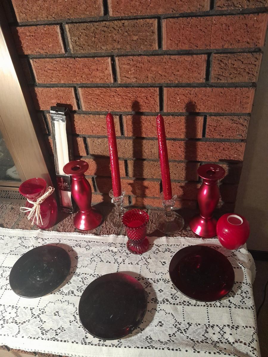 Variety of red candle holders candle plates and more