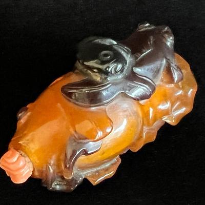 Carved Amber Koi Fish Snuff Bottle with Coral Squash Blossom Stopper