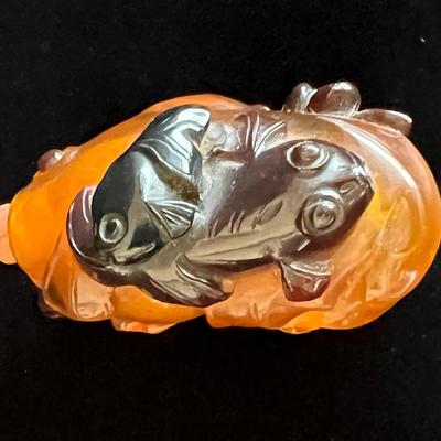 Carved Amber Koi Fish Snuff Bottle with Coral Squash Blossom Stopper