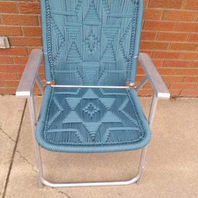 Vintage aluminum folding patio chair with macram star pattern