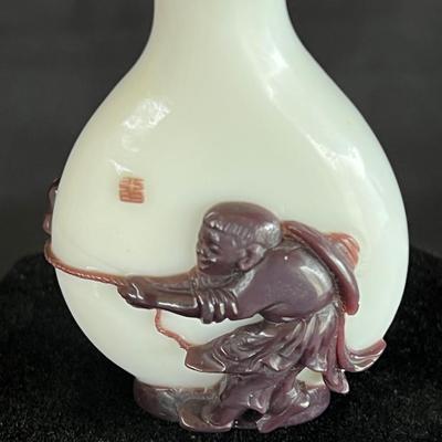 Peking Glass Snuff Bottle with Figure Pulling a Bull. Signed
