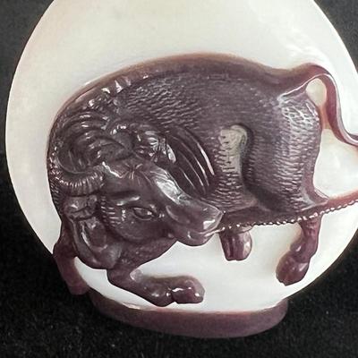 Peking Glass Snuff Bottle with Figure Pulling a Bull. Signed