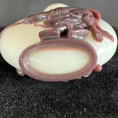 Peking Glass Snuff Bottle with Figure Pulling a Bull. Signed