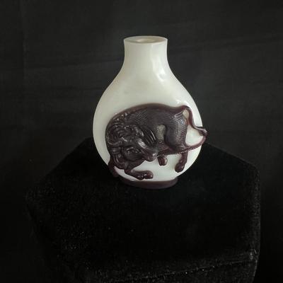 Peking Glass Snuff Bottle with Figure Pulling a Bull. Signed