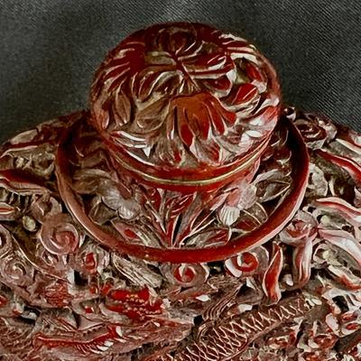 Intricately Carved Snake in a Garden Deep Reddish Brown Snuff Bottle