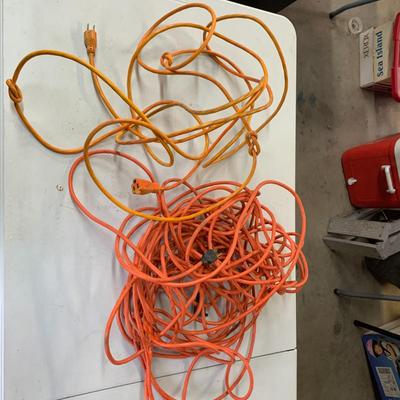#56 Two Orange Extension Cords
