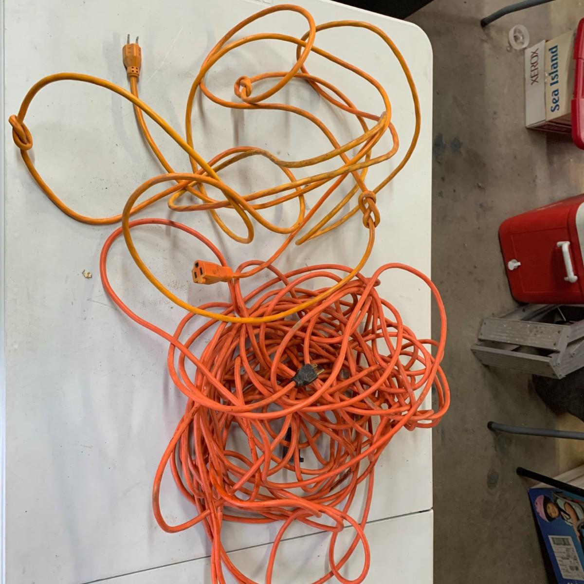 56 Two Orange Extension Cords