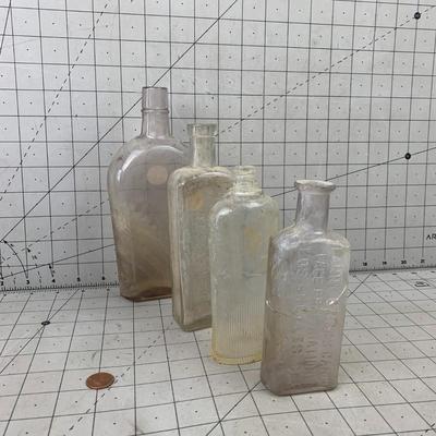 #121 Four Vintage Glass Bottles- Syrup and Other