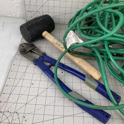 #225 Rubber Mallet, Wire Cutters, Extension Cord and Bungee 