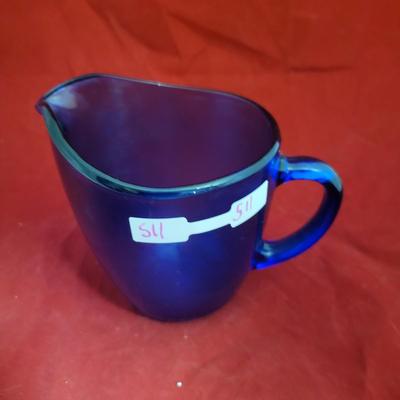 Blue glass mug