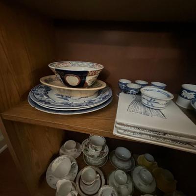 Particle Board Book Shelf w/Collectible Glassware Contents