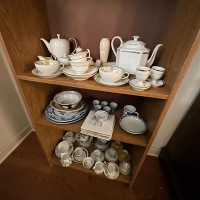 Particle Board Book Shelf w/Collectible Glassware Contents