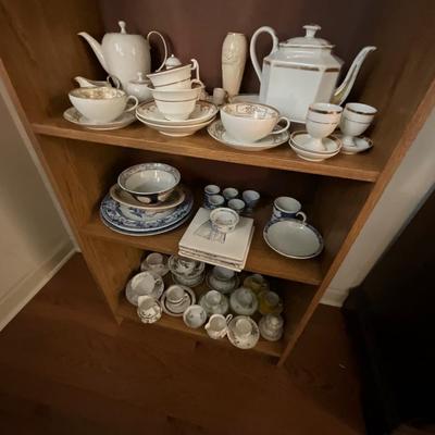Particle Board Book Shelf w/Collectible Glassware Contents