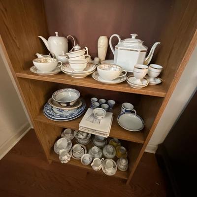 Particle Board Book Shelf w/Collectible Glassware Contents