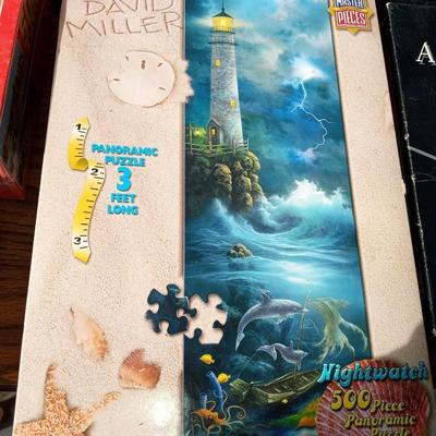 JIGSAW PUZZLES AND A BOARD GAME