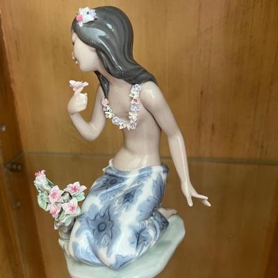 Lladro in a tropical garden
