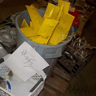 ridged yellow electrical braces, nuts and screws for heavy installation.