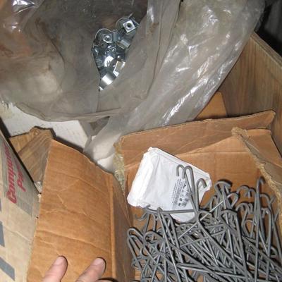 Hangers and metal tie downs for all sizes of conduit.