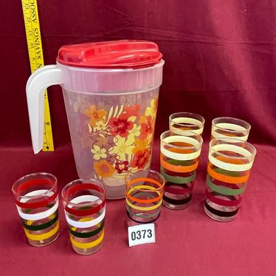1 gal red flower pitcher and 7 misc glasses