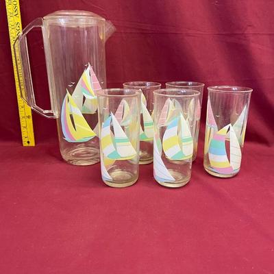 Plastic pitcher and cups