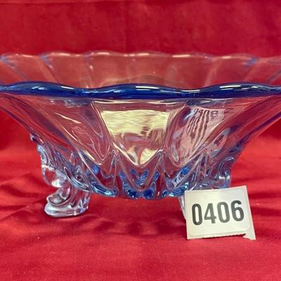Vtg light blue footed glass bowl with curved edge