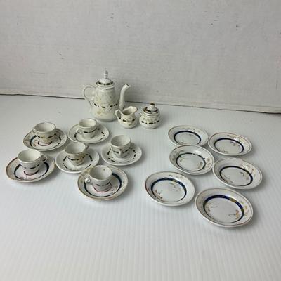 1053 Antique Childs Porcelain Tea-set