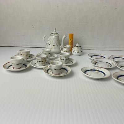 1053 Antique Childs Porcelain Tea-set