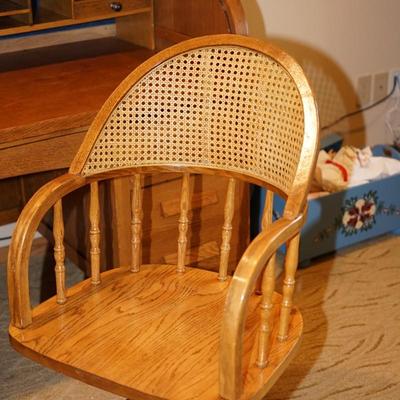 REPRODUCTION OAK ANTIQUE OFFICE CHAIR W/ SWIVEL BASE/ SPINDLE AND CANED BACK
