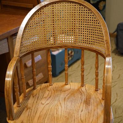 REPRODUCTION OAK ANTIQUE OFFICE CHAIR W/ SWIVEL BASE/ SPINDLE AND CANED BACK
