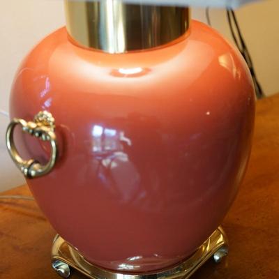 MODERN STYLE ASIAN PORCELAIN TABLE LAMPS IN RUST ORANGE TONES, BRASS RINGS AND PLATEAUS.