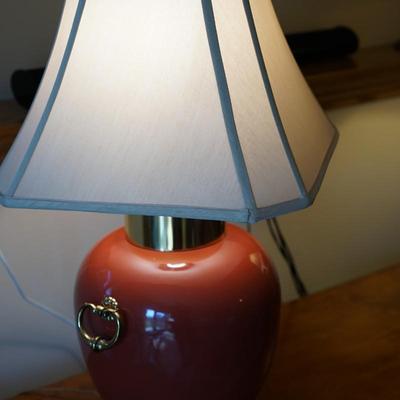 MODERN STYLE ASIAN PORCELAIN TABLE LAMPS IN RUST ORANGE TONES, BRASS RINGS AND PLATEAUS.