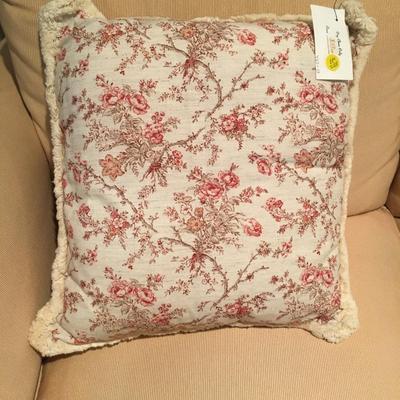 floral design pillow with fringe trim