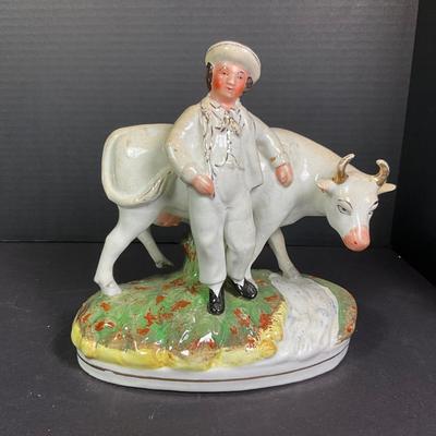 1121 Antique Staffordshire Cow with Boy Figure
