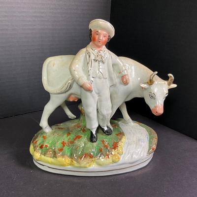 1121 Antique Staffordshire Cow with Boy Figure