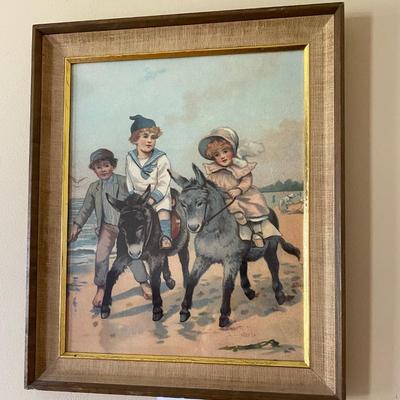 Framed Children Riding Donkey at Seaside Print