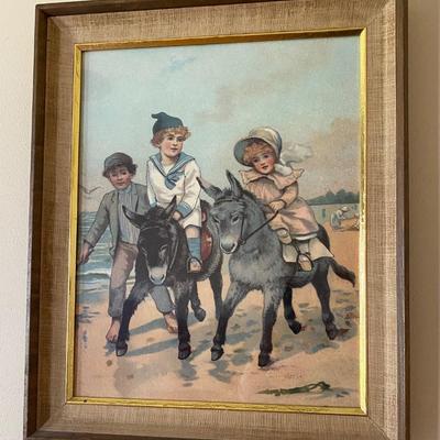 Framed Children Riding Donkey at Seaside Print