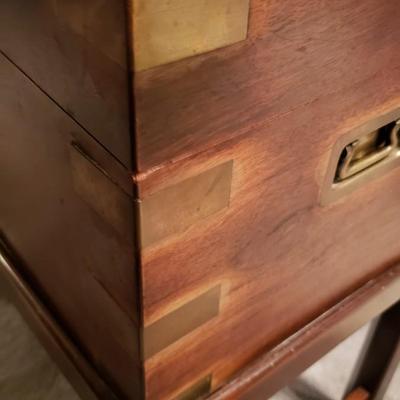 Brass and wood campaign chest on stand