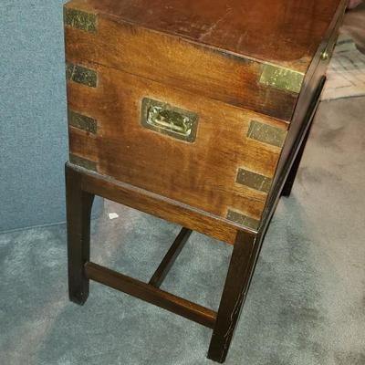 Brass and wood campaign chest on stand