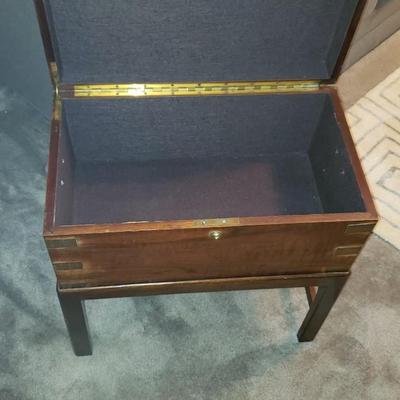 Brass and wood campaign chest on stand
