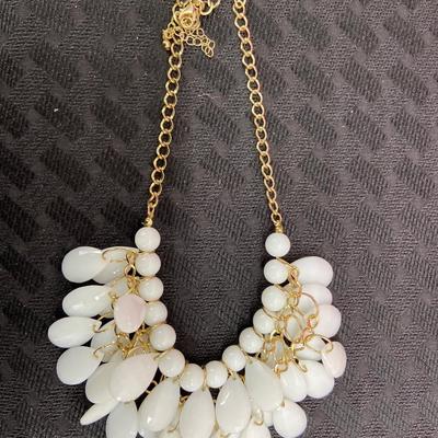 white and gold tone statement necklace