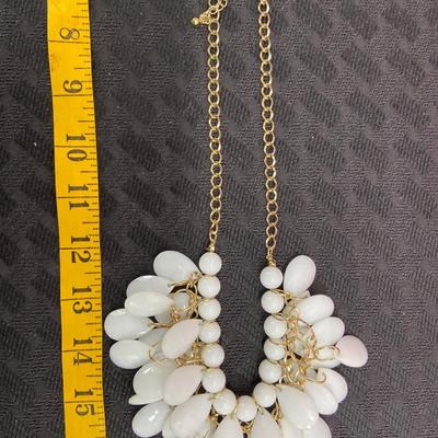 white and gold tone statement necklace