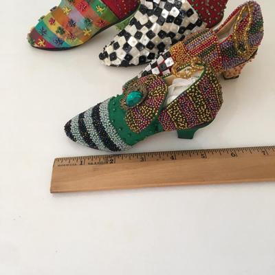 Collection of beaded shoe figures