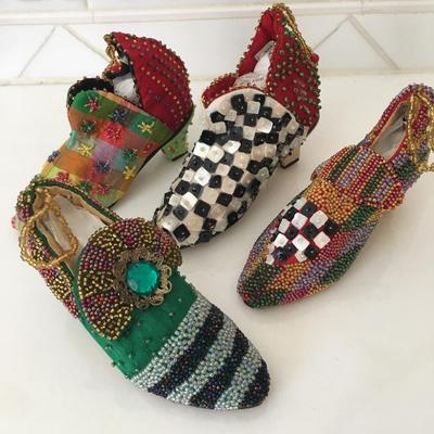Collection of beaded shoe figures