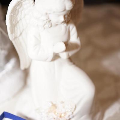 GROUPING OF ANGELS TWO BISQUE /BOUQUET OF FLOWERS WHICH  LIGHT. JEWELED CROSS DECORATIVE E ORNAMENT