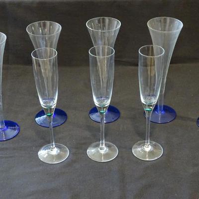 Two Sets of Flute Champagne Glasses, one set with Cobalt Blue  Base