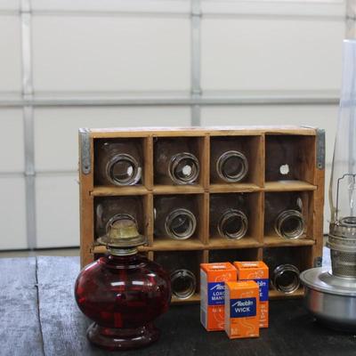Vintage Two Oil Lamps and Wooden Milk Crate w Bottles; x11 Glass Milk Bottles