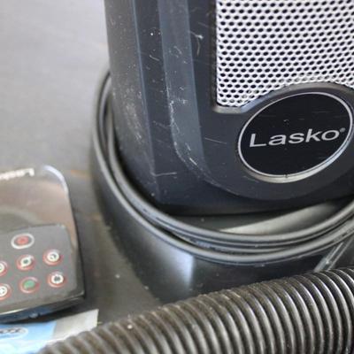 Sanitaire Commercial Vacuum Cleaner, Vornado 12" Fan, Lasko Oscillating Fan Tower