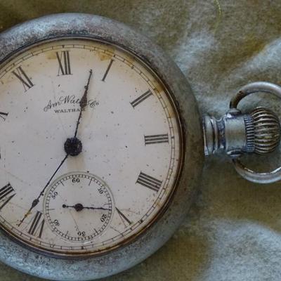 Vintage Silver Tone AM Watch Co. Waltham Mechanical Pocket Watch With Stopwatch Dial Featuring White Face & Roman Markings; and...