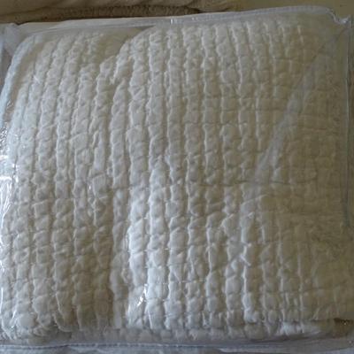 Set of Four Throw Blankets, One Quilt and Two Ivory Shag Rugs