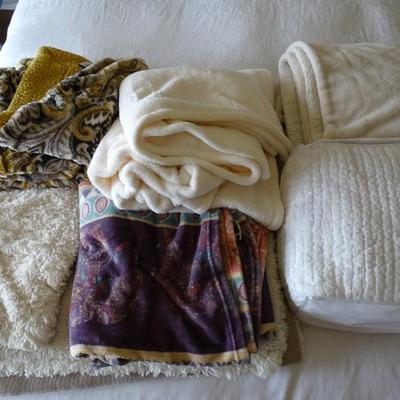 Set of Four Throw Blankets, One Quilt and Two Ivory Shag Rugs